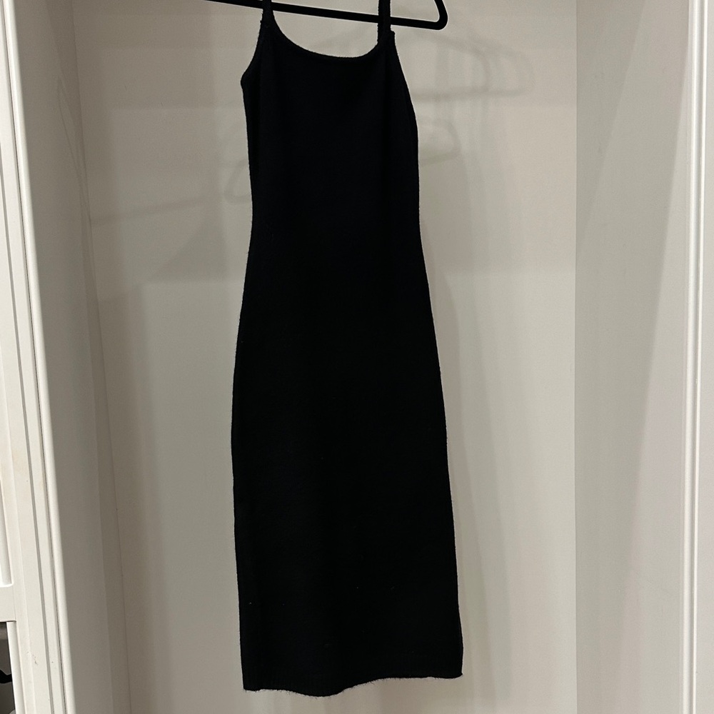Line and Dot size small Elegant Black Women's sweater Dress.  New